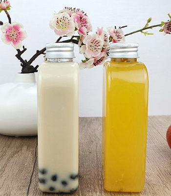 Bouteilles potables en plastique plates de Juice Milk 400ml avec le chapeau